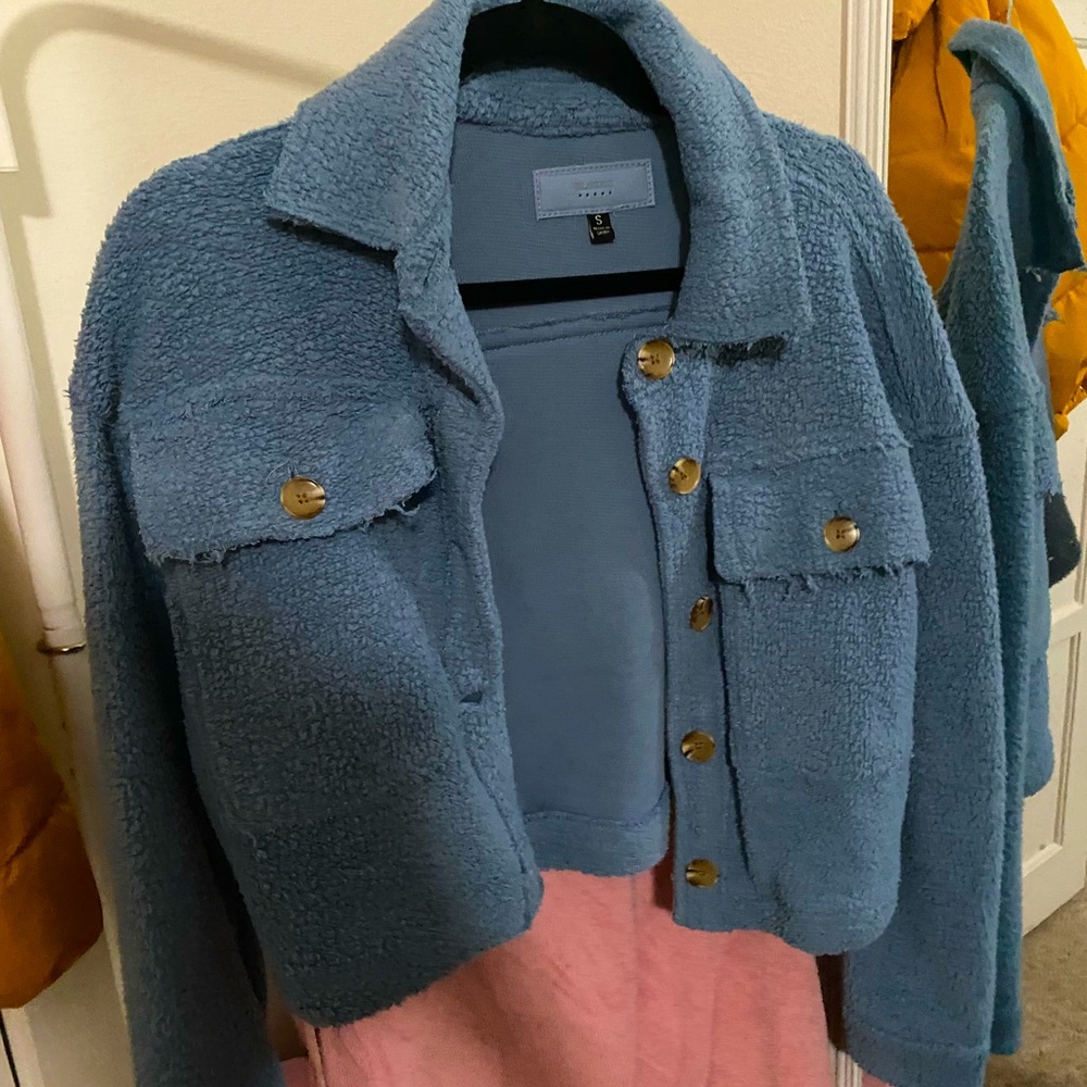 Never worn blue fuzzy jacket